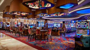 Tabel Hasil marioqq menampilkan daftar hasil permainan casino dengan kolom tanggal, jenis permainan, stake, dan hasil
